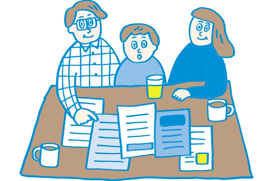 制度や条件を確認している子どもと保護者